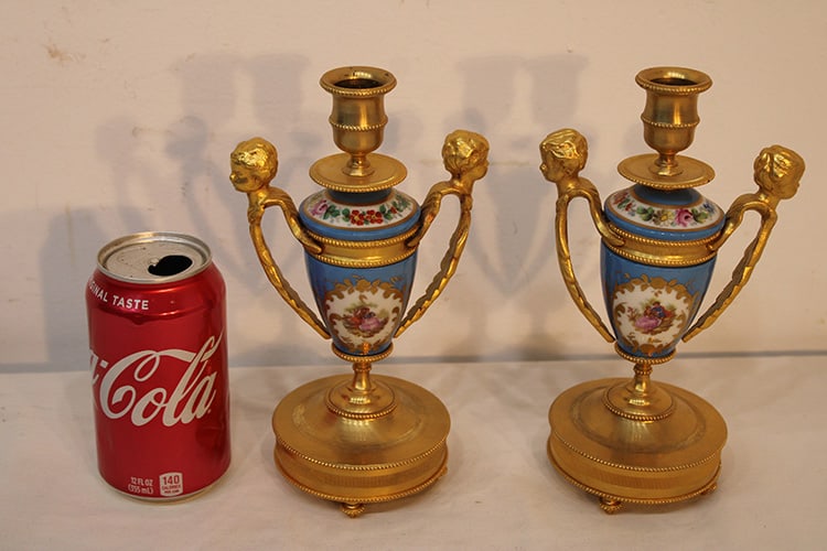Wonderful Pair of Antique Sevres Style Porcelain & Gilt Bronze Candlesticks: Wonderful Pair of Antique Sevres Style Porcelain & Gilt Bronze Candlesticks. With figural handles in real nice condition. Estate fresh. Appr. 8" tall.