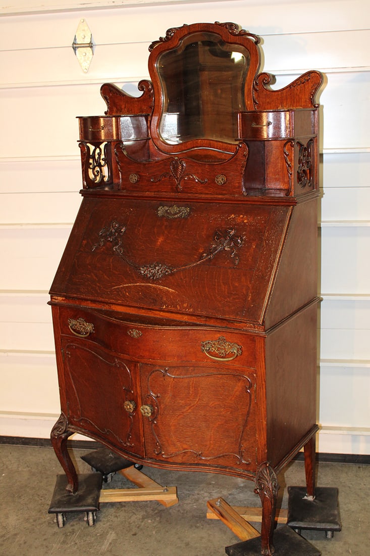 Antique Oak "Cowgirl Style" Drop Front Desk: Antique Oak "Cowgirl Style" Drop Front Desk. Fancy swivel mirror, open fretwork on the side, carved lid with serpentine doors and a fitted interior. All quarter sawn, old finish. 30" wide X 61" tall X