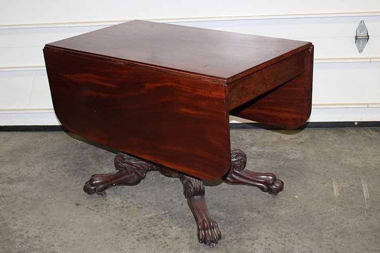 Classical Federal Period Acanthus Carved Dropleaf Table: Classical Federal Period Acanthus Carved Dropleaf Table. Large carved center pedestal and claw feet, all in Mahogony. In nice condition from the Chatham estate. 40" wide X 29" tall X 23" deep.