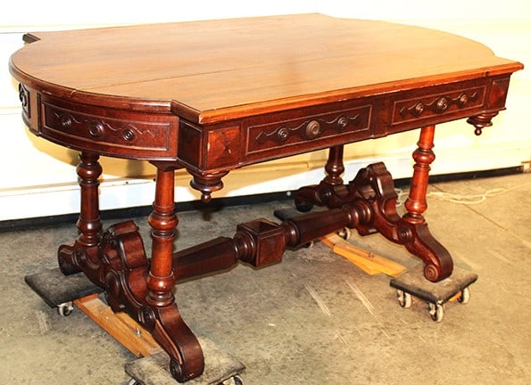 Large 54" Victorian Partners Desk: Large 54" Victorian Partners Desk. Renaissance Revival in walnut, a nice stretcher base with a drawer on each side. Has a small chip on 1 foot (see photo). 54" wide X 27" tall X 32" deep.