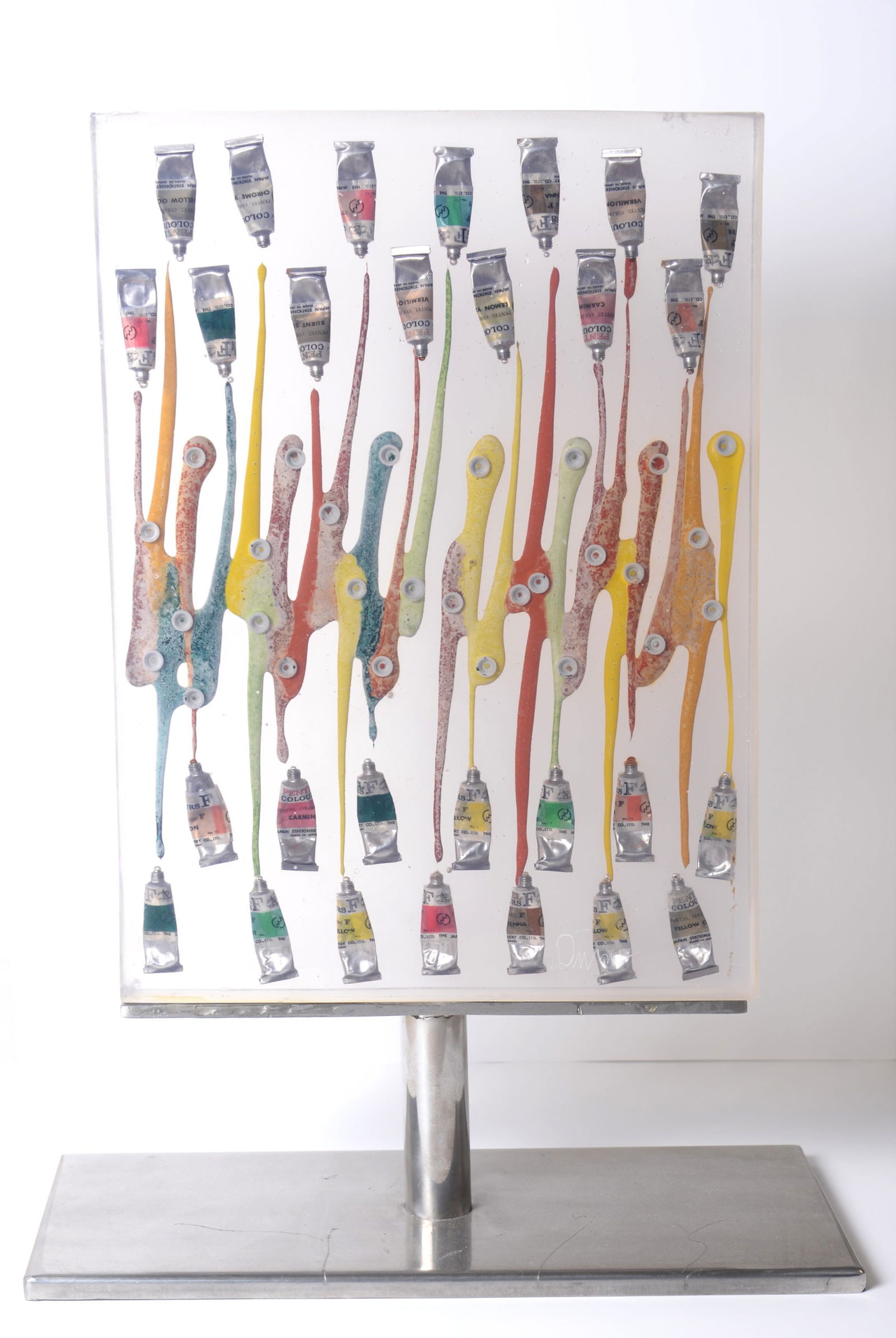 Arman : Small Tubes, 1973 - Hand-signed: Arman (1928-2005)Small Tubes, 1973Twenty-eight small paint tubes, oil, plastic caps and resin.Hand-signed in the plexiglass.A multiple from an edition of 30. Not numbered.This is the same piece as the