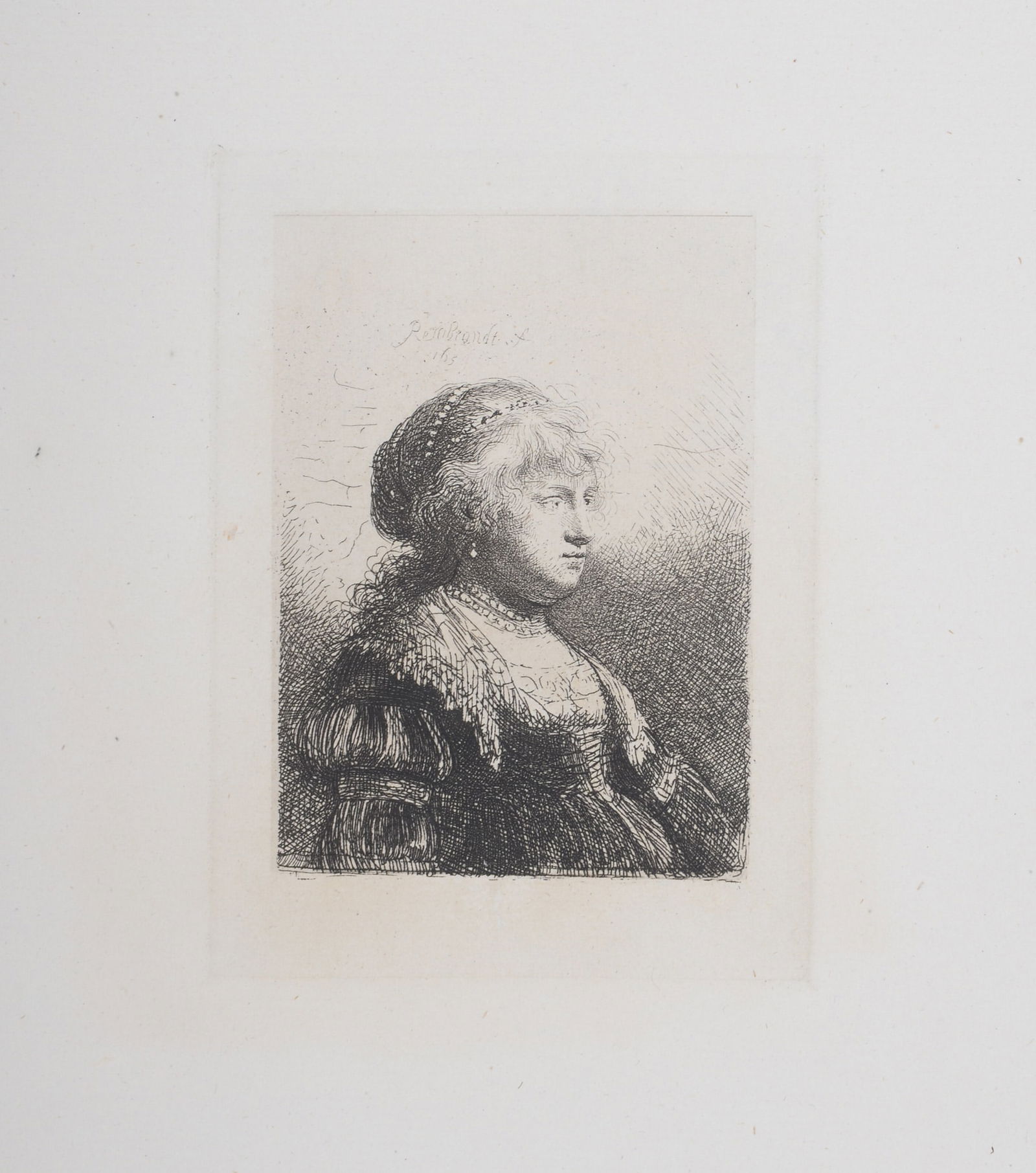 Rembrandt (After) : La jeune femme de Rembrandt coiffee en cheveux, 1880: Rembrandt Van Rijn, said Rembrandt (After)La jeune femme de Rembrandt coiffee en cheveux, 1880Heliogravure on Verge paper, after 1665 Rembrandt's etching (referenced in Bartsch 347).Plate-signed and d