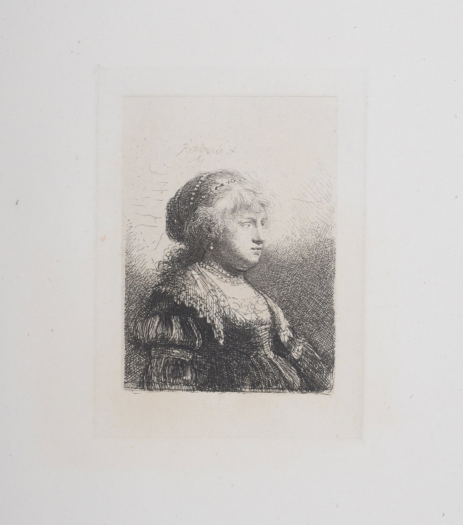 Rembrandt (After) : La jeune femme de Rembrandt coiffee en cheveux, 1880: Rembrandt Van Rijn, said Rembrandt (After) La jeune femme de Rembrandt coiffee en cheveux, 1880 Heliogravure on Verge paper, after 1665 Rembrandt's etching (referenced in Bartsch 347). Plate-signed an