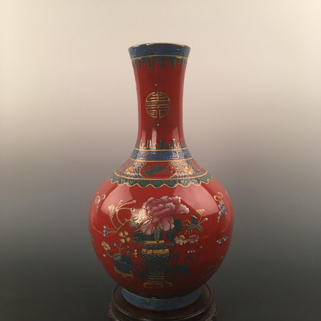 Chinese Famille Rose Of Peony Pattern Decorated: Chinese Famille Rose Of Peony Pattern Decorated Porcelain Globular Vase With Kangxi's Mark 15-1/4'' H, 8-1/2'' W; 6.4 lb Shipping: We are able to pack and ship this item to an address in the United St