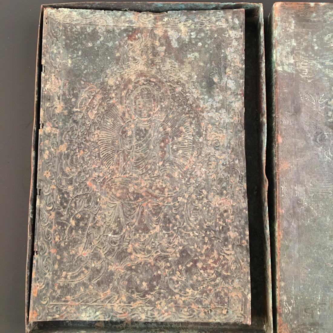 Chinese Bronze Booklet Of Buddhist Scriptures: Chinese Bronze Booklet Of Buddhist Scriptures 15mm H, 6'' W, 8-1/2'' L; 1.6 lb Shipping: We are able to pack and ship this item to an address in the United States for $30 via UPS Ground or USPS Priori