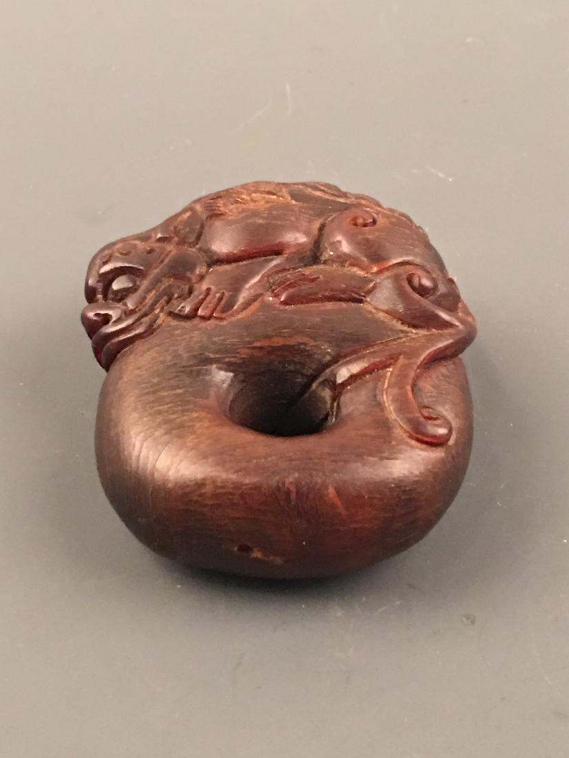 Chinese Ox Horn Pendant: Chinese Ox Horn Pendant 2-1/4'' H, 1-7/8'' W; 51 g Shipping: We are able to pack and ship this item to an address in the United States for $25.00 via UPS Ground or USPS Priority Mail. Tracking informa