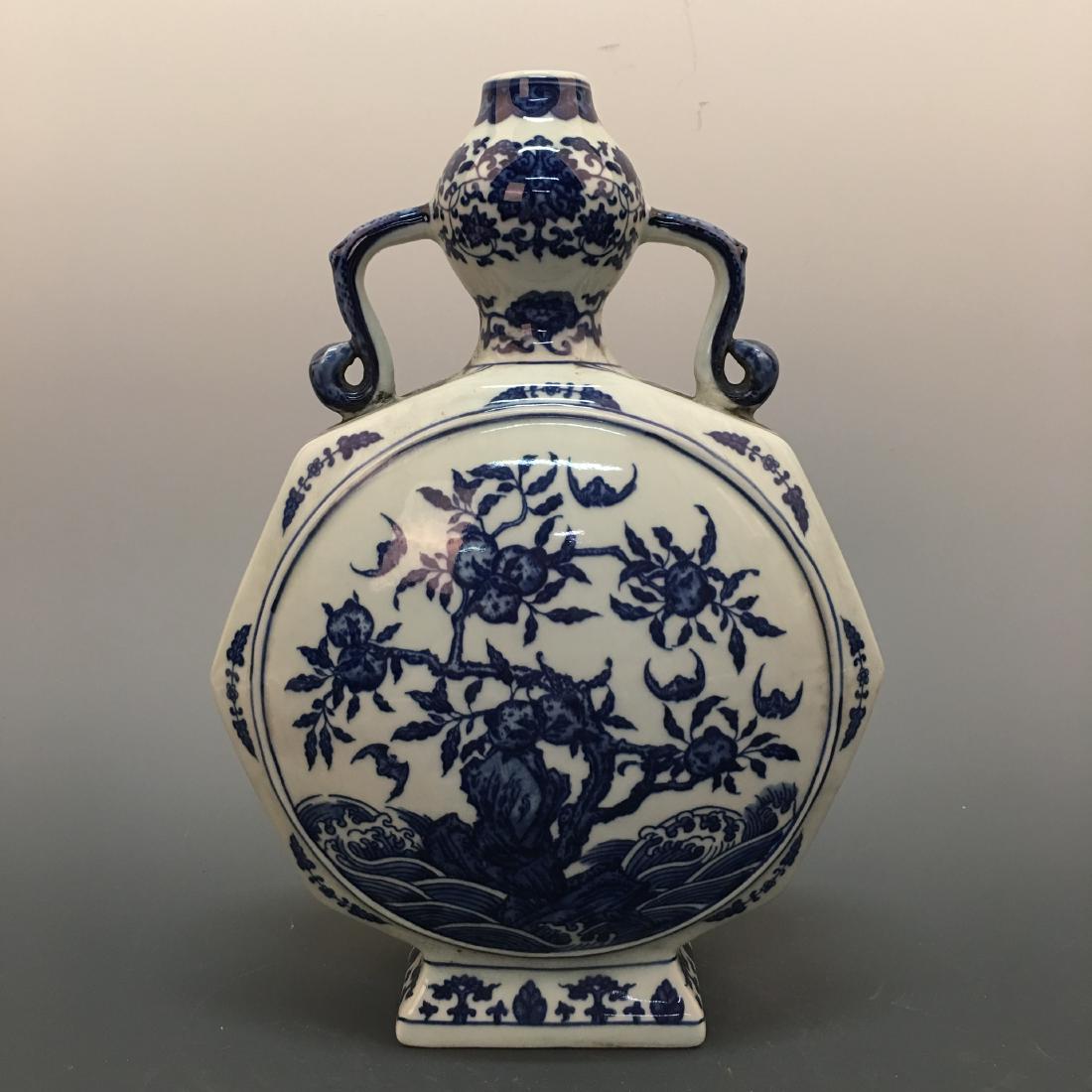 Chinese Blue-White Moon Flask Vase, Qianlong Mark: Chinese Blue-White Moon Flask Vase, Qianlong Mark 12-3/4'' H, 9'' W; 0.4 lb Shipping: We are able to pack and ship this item to an address in the United States for $35.00 via UPS Ground or USPS Priori