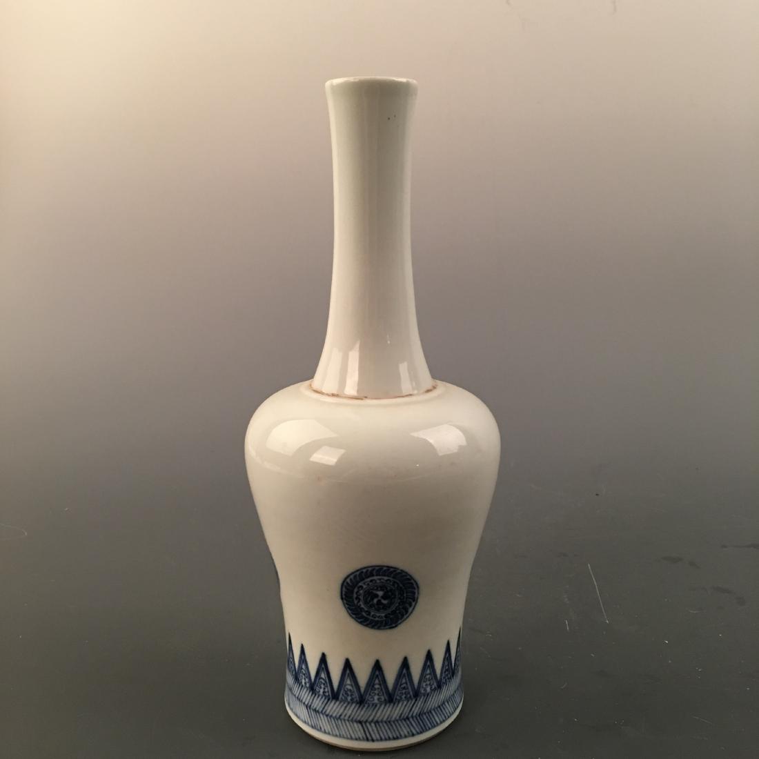 Chinese Blue-White Bottle Vase, Kangxi Mark: Chinese Blue-White Bottle Vase, Kangxi Mark 9-1/2'' H; 3-5/8'' W; 1 lb Shipping: We are able to pack and ship this item to an address in the United States via UPS Ground or USPS Priority Mail, inquiry