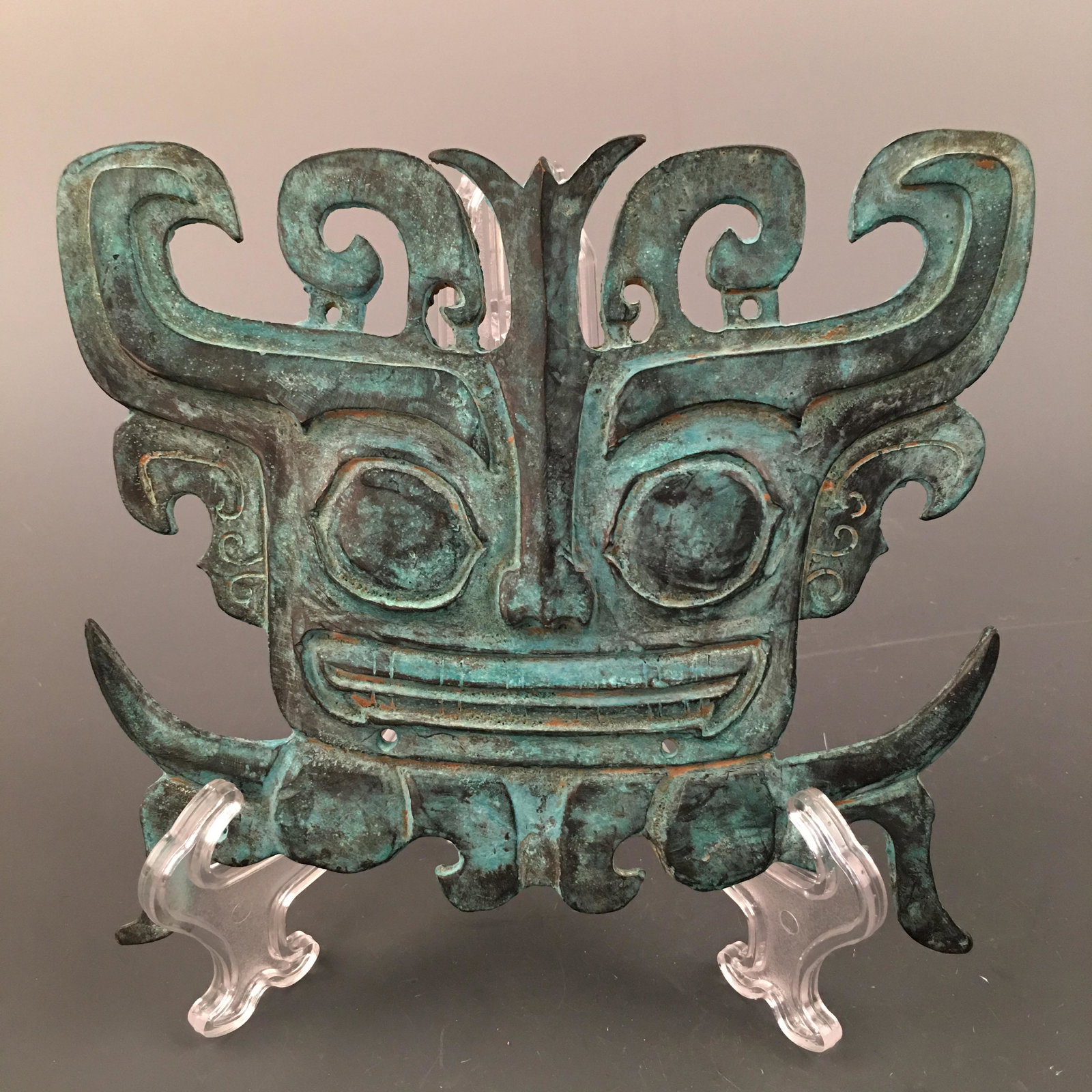 Chinese Bronze Mask: Chinese Bronze Mask 5-1/2'' H; 7-1/4'' W; 1.2 lb Shipping: We are able to pack and ship this item to an address in the United States via UPS Ground or USPS Priority Mail, inquiry for quote. Tracking i