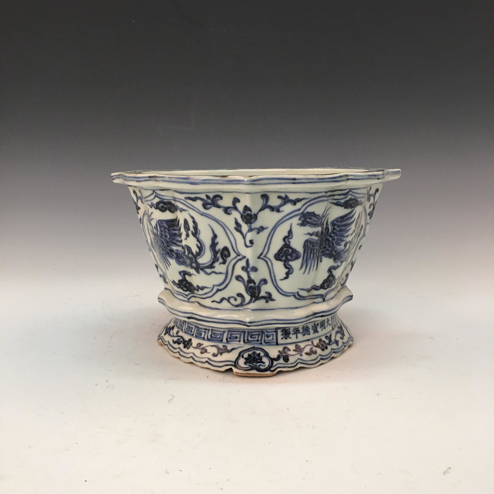 Chinese Blue-White 'Phoenix' Vessel, Xuande Mark: Chinese Blue-White 'Phoenix' Vessel, Xuande Mark 5-1/4'' H 8'' W 3 lb Shipping: We are able to pack and ship this item to an address in the United States via UPS Ground or USPS Priority Mail for $45.0