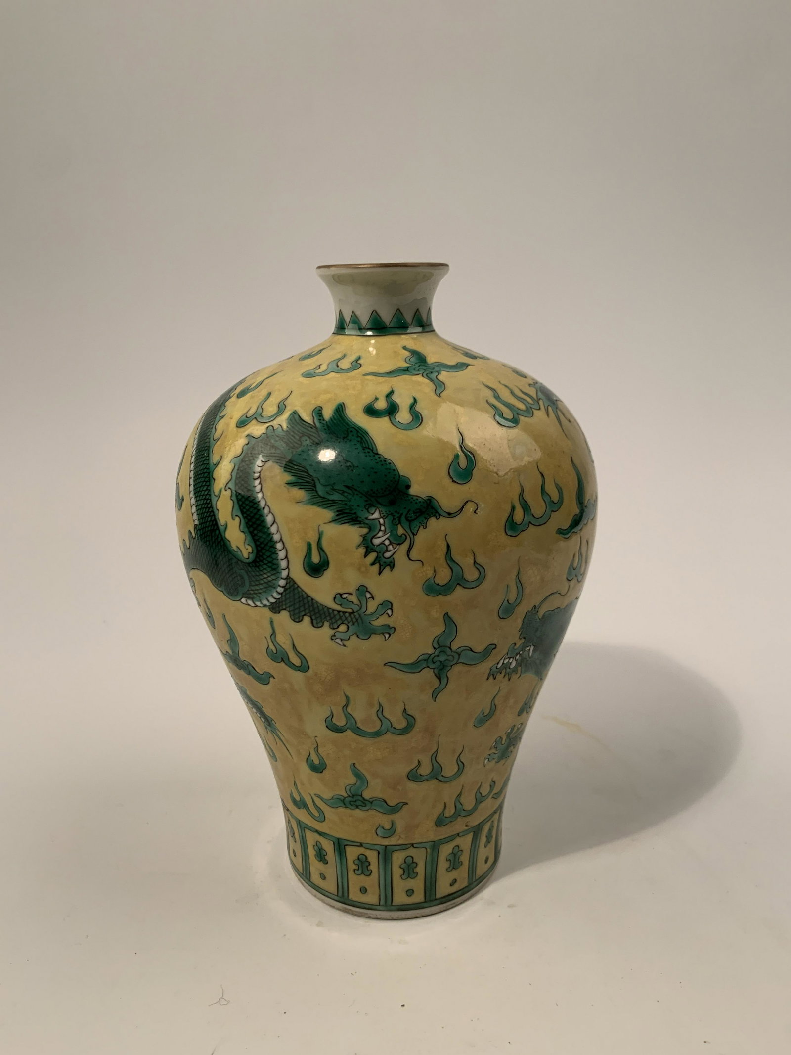 Chinese Yellow and Green Dragon Vase: Chinese Yellow and Green Dragon Vase 9'' H 5-1/2'' W 2 lb Shipping: We are able to pack and ship this item to an address in the United States via UPS Ground or USPS Priority Mail for $35 Tracking info