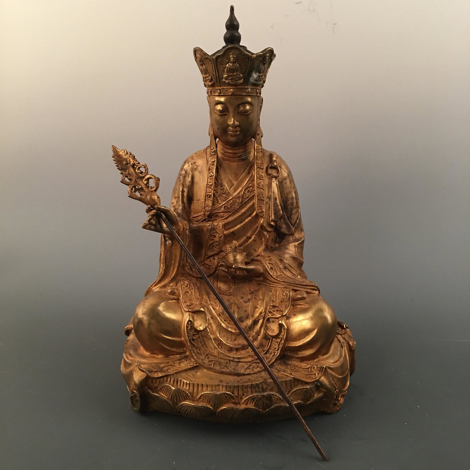 Chinese Gilt Bronze Ksitigarbha Figure, Yongle Mark: Chinese Gilt Bronze Ksitigarbha Figure, Yongle Mark 15'' H; 9'' W; 3571 g Shipping: We are able to pack and ship this item to an address in the United States via UPS Ground or USPS Priority Mail, inqu