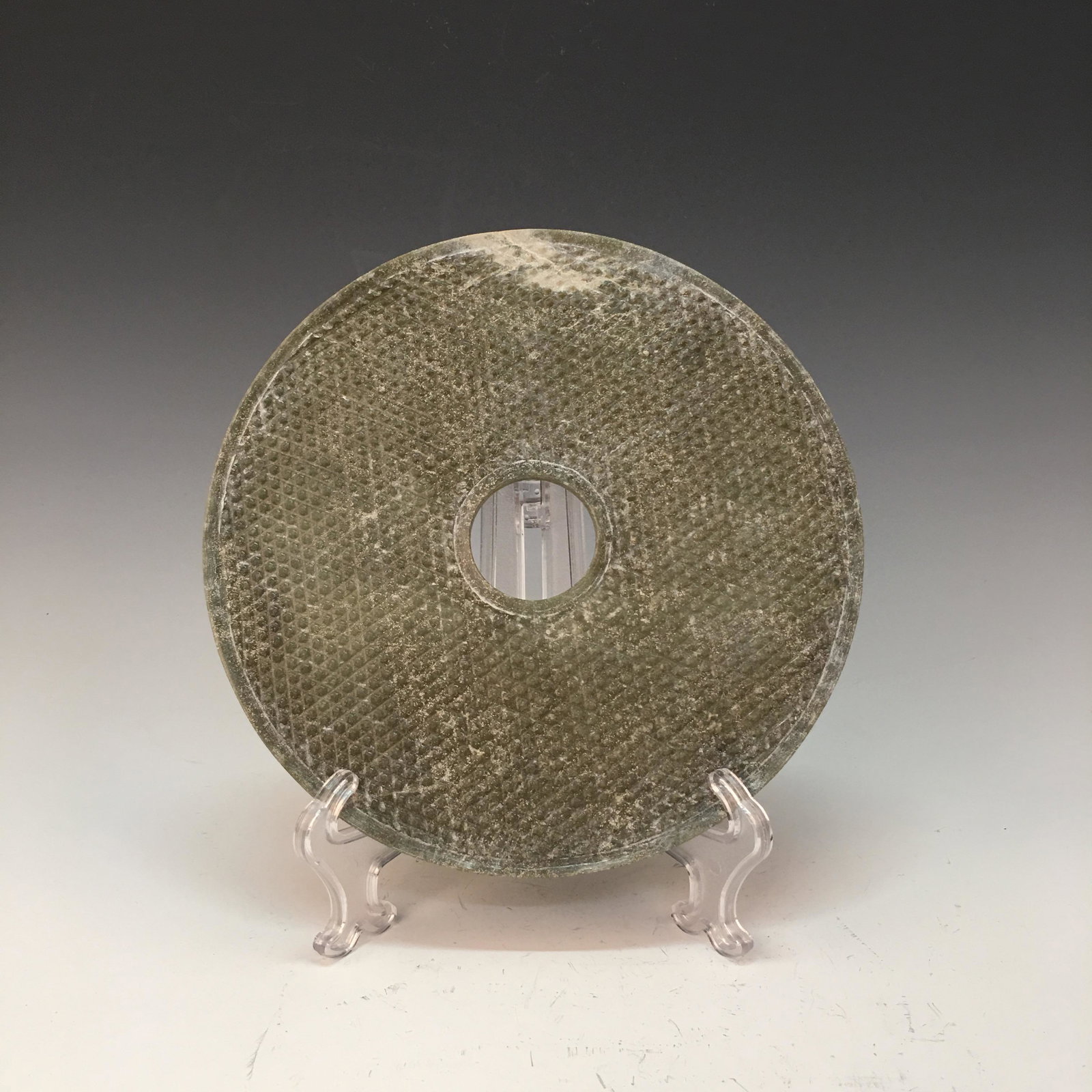 Chinese Jade Bi: Chinese Jade Bi D. 8-1/8''; 0.8 lb Shipping: We are able to pack and ship this item to an address in the United States for $30.00 via UPS Ground or USPS Priority Mail. Tracking information will be sen
