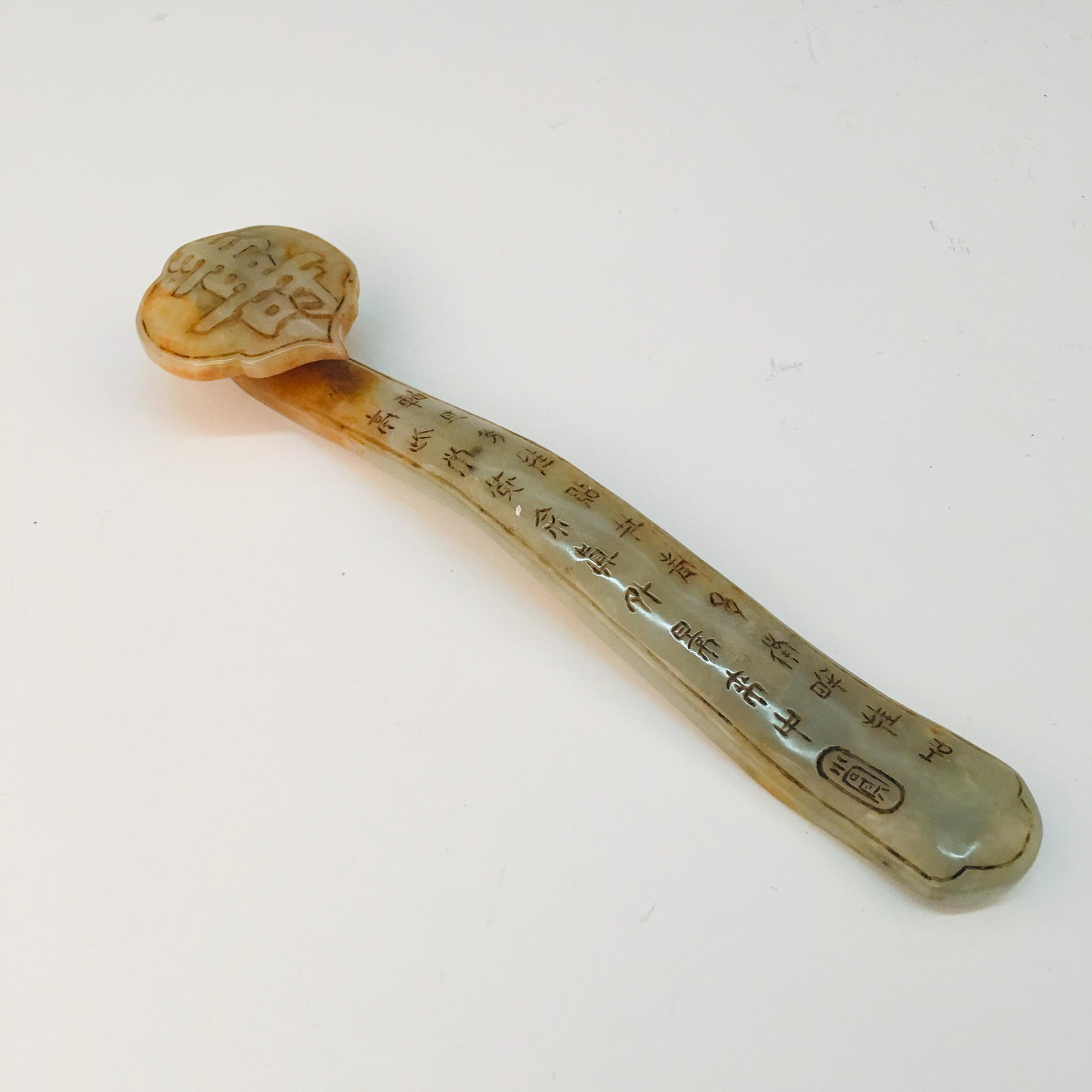 Chinese Jade 'Shou' Ruyi: Chinese Jade 'Shou' Ruyi 9-3/8'' H, 1-1/4'' W; 0.4 lb We are able to pack and ship this item to an address in the United States for $35.00 via UPS Ground or USPS Priority Mail. Tracking information wi
