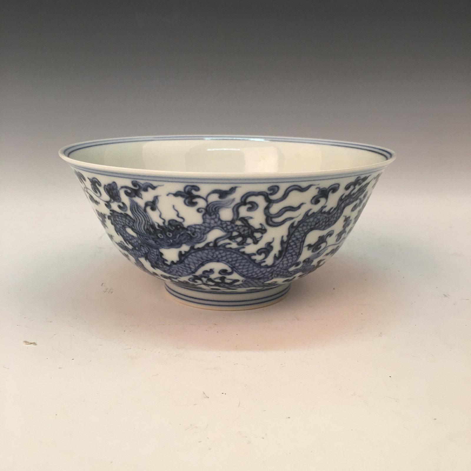 Chinese Blue-White 'Dragon' Bowl, Chenghua Mark: Chinese Blue-White 'Dragon' Bowl, Chenghua Mark 2-3/4'' H, 6-1/4'' W; 0.4 lb Shipping: We are able to pack and ship this item to an address in the United States for $35.00 via UPS Ground or USPS Prior