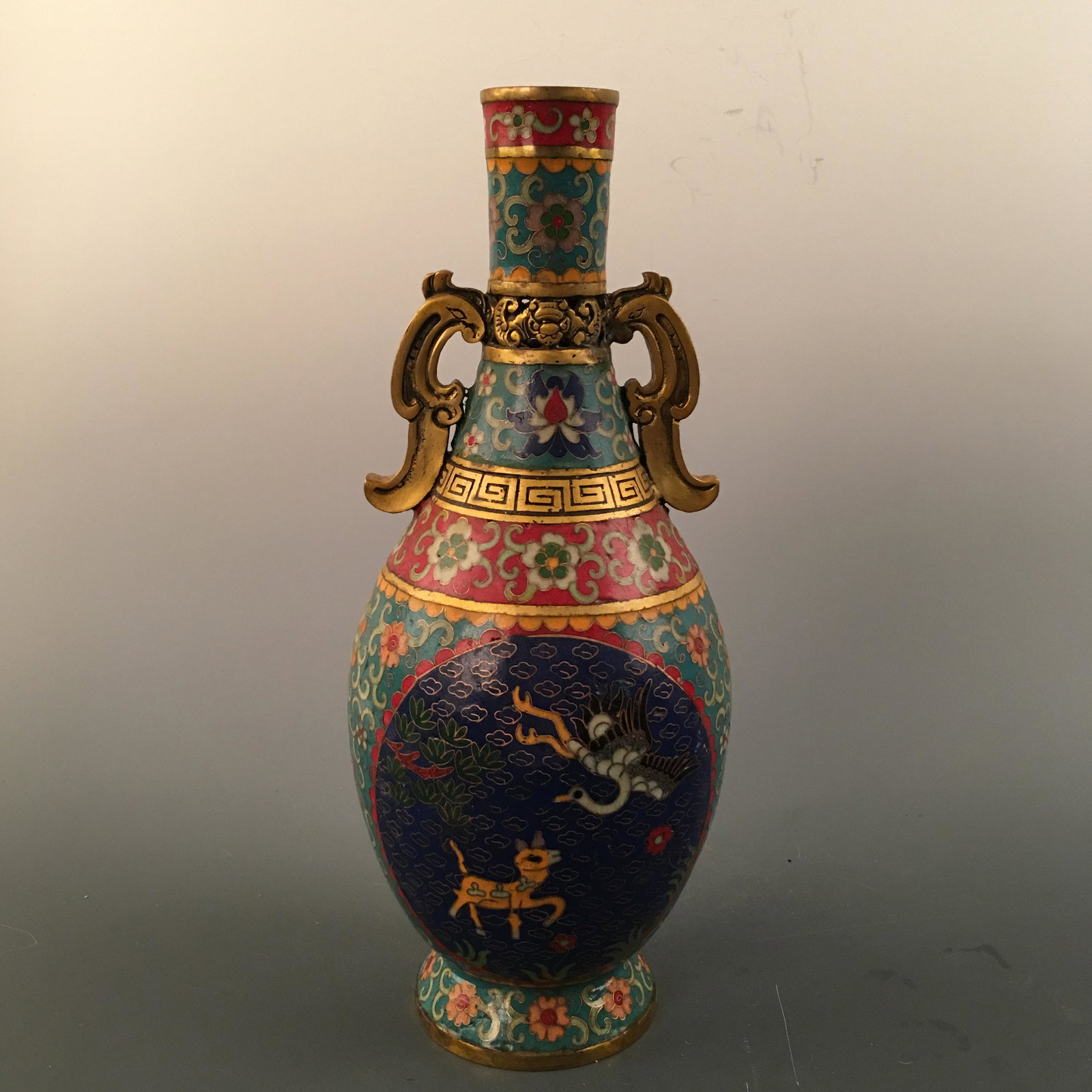 Chinese CloisonnÃ© Bronze Vase, Qianlong Mark: Chinese CloisonnÃ© Bronze Vase, Qianlong Mark 14-5/8'' H; 6'' W; 6.6 lb Shipping: We are able to pack and ship this item to an address in the United States via UPS Ground or USPS Priority Mail, inqu