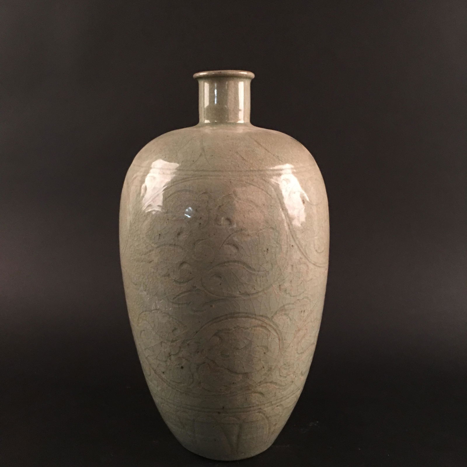 Chinese White Glazed Carved Porcelain Mei Ping Vase: Chinese White Glazed Carved Porcelain Mei Ping Vase 13-3/4'' H, 7-1/2'' W; 8.8 lb Shipping: We are able to pack and ship this item to an address in the United States for $35.00 via UPS Ground or USPS