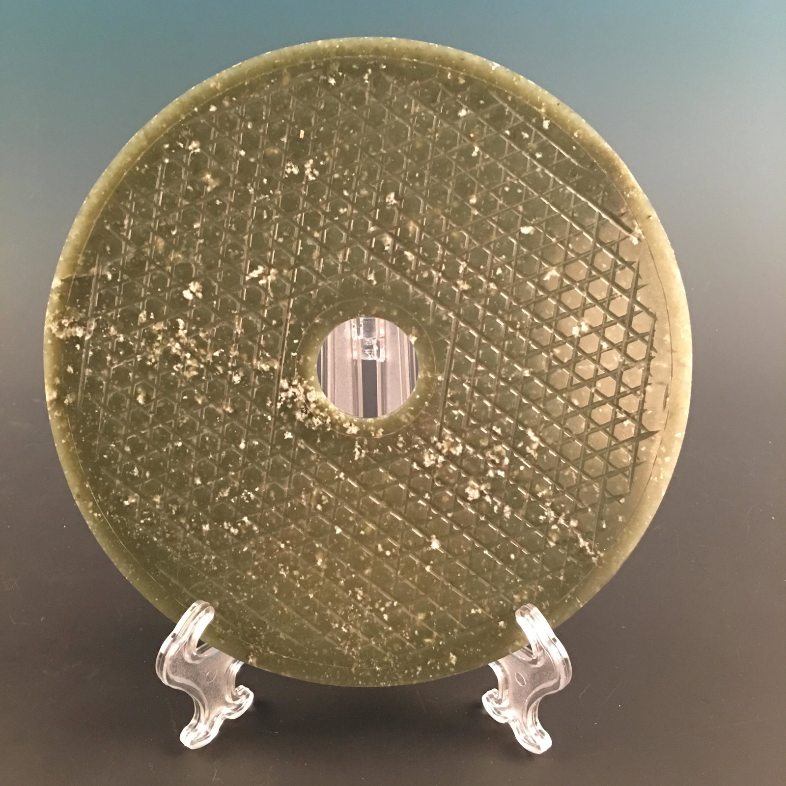 Chinese Jade Bi: Chinese Jade Bi D. 8-1/2''; 609 g Shipping: We are able to pack and ship this item to an address in the United States for $25.00 via UPS Ground or USPS Priority Mail. Tracking information will be sent