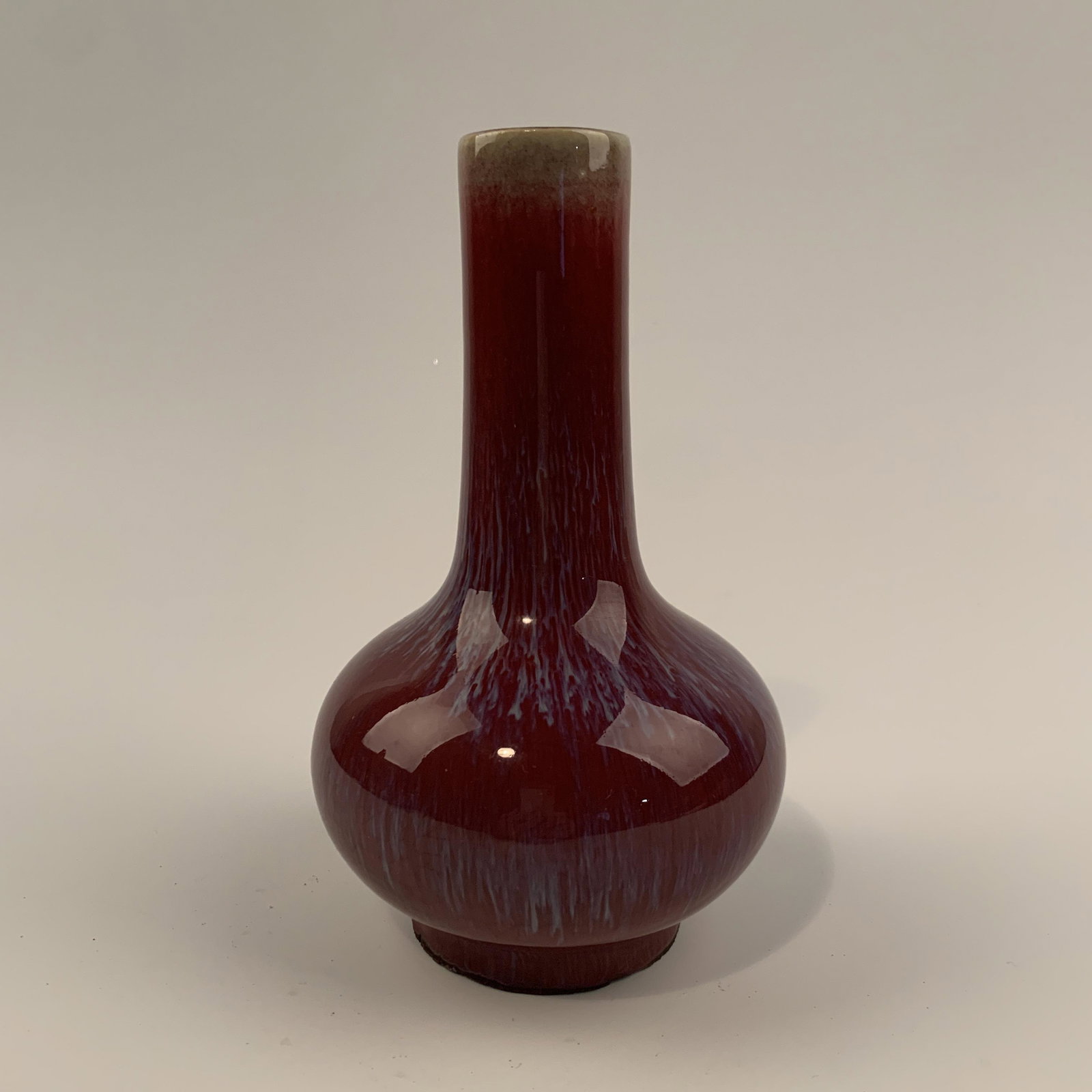 Chinese Red Glaze Porcelain Vase: Chinese Red Glaze Porcelain Vase 9-1/2'' H, 5-3/4'' W; 1.6 lb Shipping: We are able to pack and ship this item to an address in the United States for $35 via UPS Ground or USPS Priority Mail. Tracking