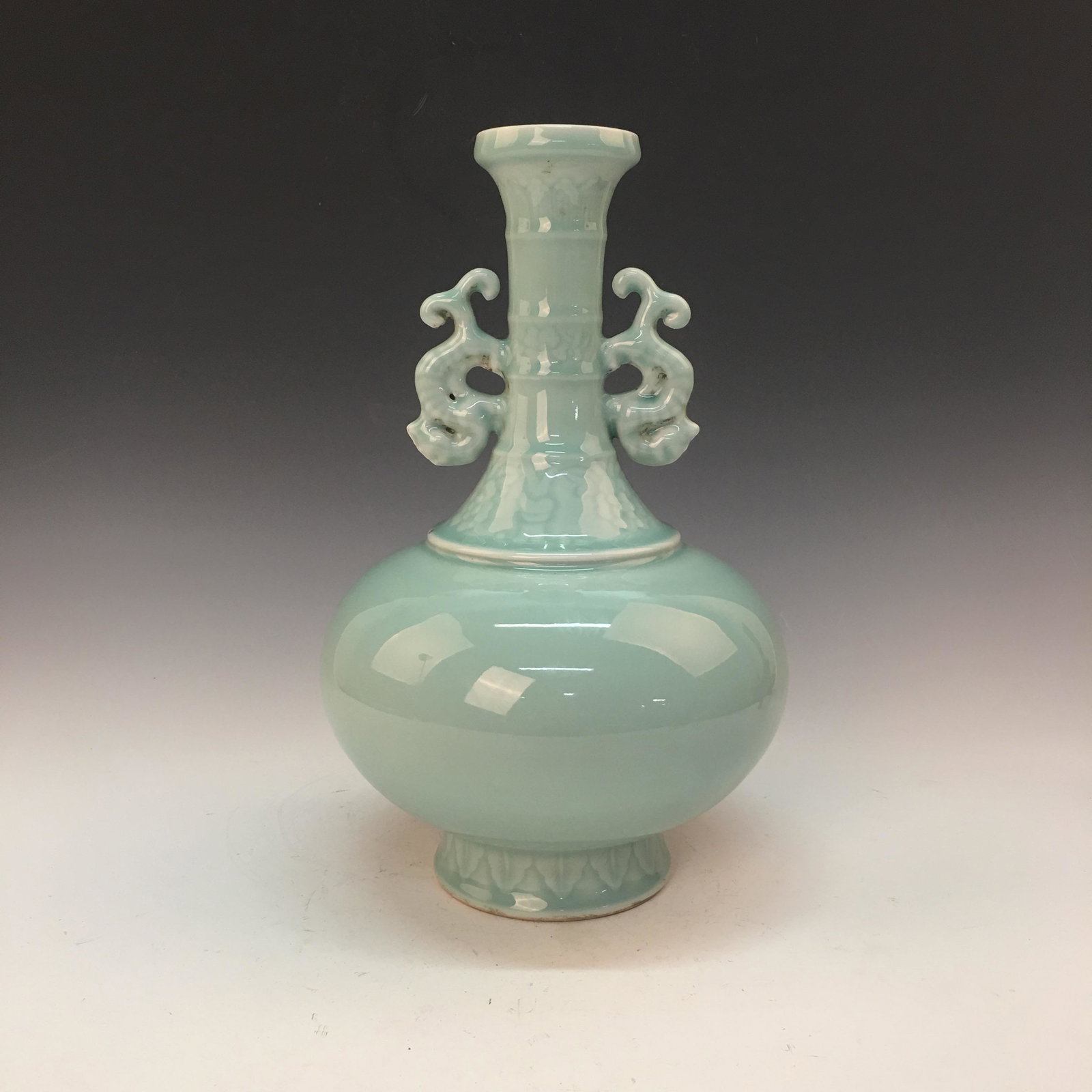 Chinese Green Glazed Vase, Qianlong Mark: Chinese Green Glazed Vase, Qianlong Mark 13'' H, 7'' W; 5.8 lb Shipping: We are able to pack and ship this item to an address in the United States for $40.00 via UPS Ground or USPS Priority Mail. Trac