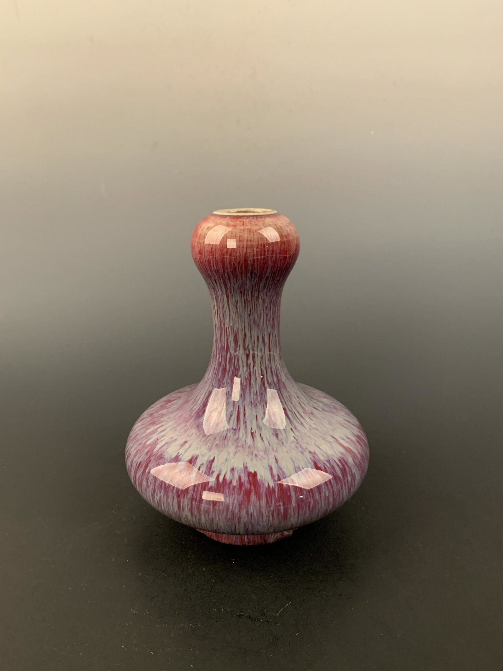 Chinese Flambe Glazed Porcelain Vase: Chinese Flambe Glazed Porcelain Vase 8'' H, 6'' W; 2.4 lb Shipping: We are able to pack and ship this item to an address in the United States for $30.00 via UPS Ground or USPS Priority Mail. Tracking 