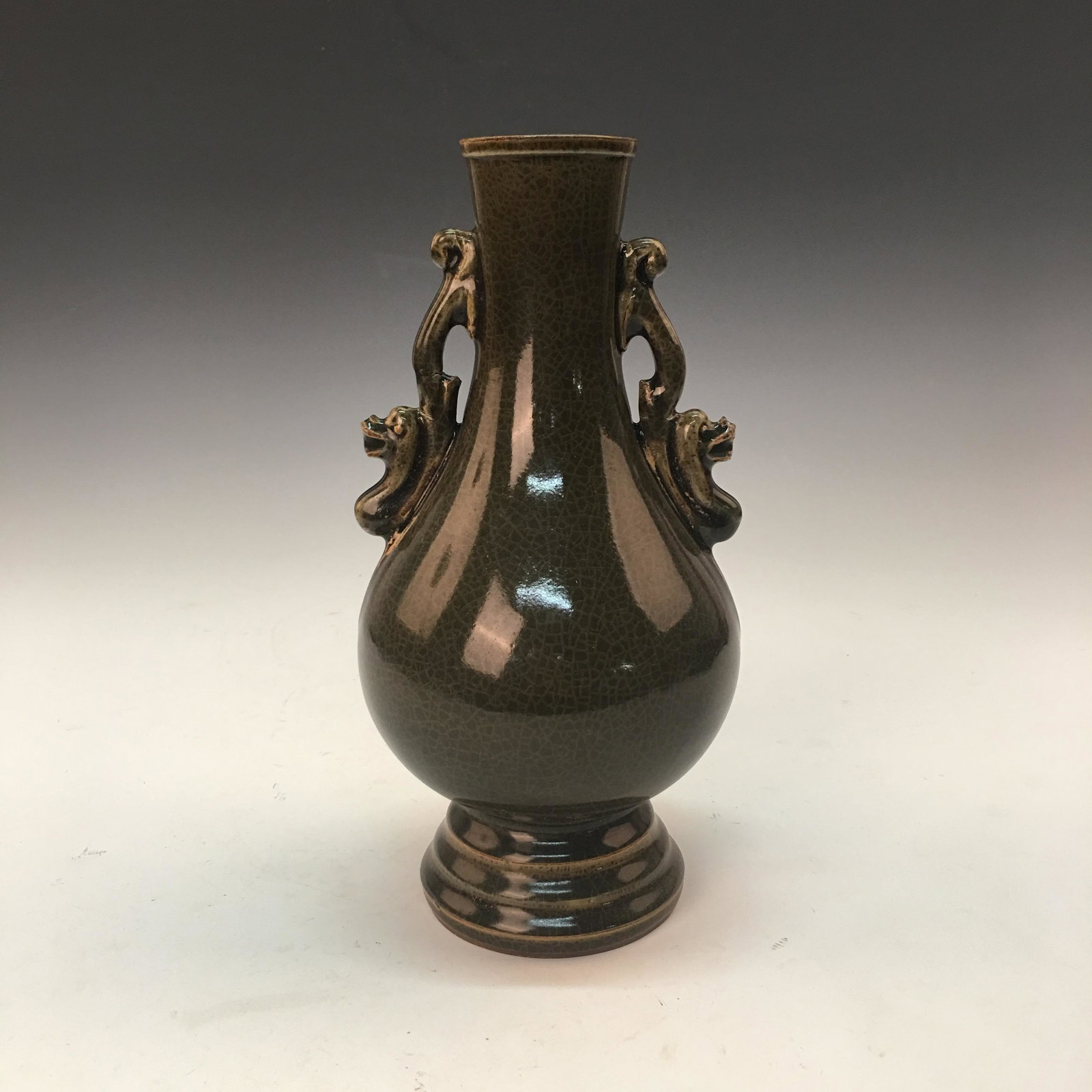 Chinese Green Glazed Vase: Chinese Green Glazed Vase 9-1/2'' H, 4'' W; 1.8 lb Shipping: We are able to pack and ship this item to an address in the United States for $40.00 via UPS Ground or USPS Priority Mail. Tracking informa