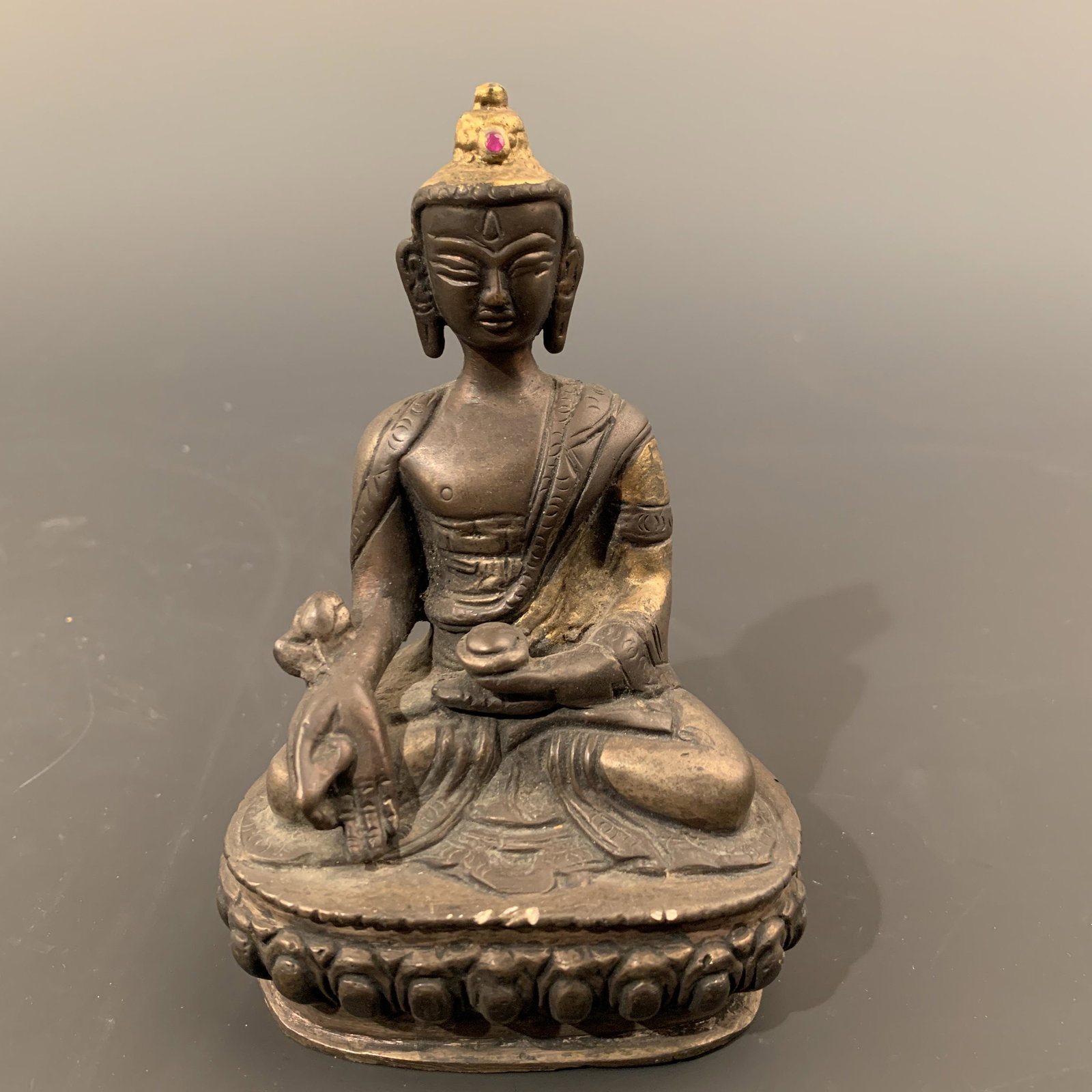 Chinese Gilt Bronze Figure of Amitabita: Chinese Gilt Bronze Figure of Amitabita 4-3/4'' H 3-1/4'' W 519 g Shipping: We are able to pack and ship this item to an address in the United States via UPS Ground or USPS Priority Mail for $35.00. T