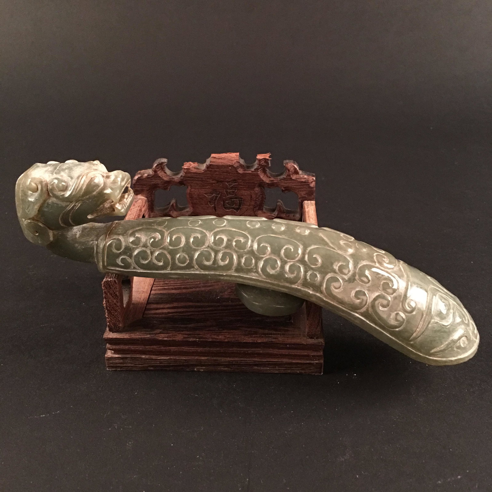 Chinese Archaic Jade Belt Buckle: Chinese Archaic Jade Belt Buckle 1-1/2'' H, 7'' W; 240 g Shipping: We are able to pack and ship this item to an address in the United States for $25.00 via UPS Ground or USPS Priority Mail. Tracking i