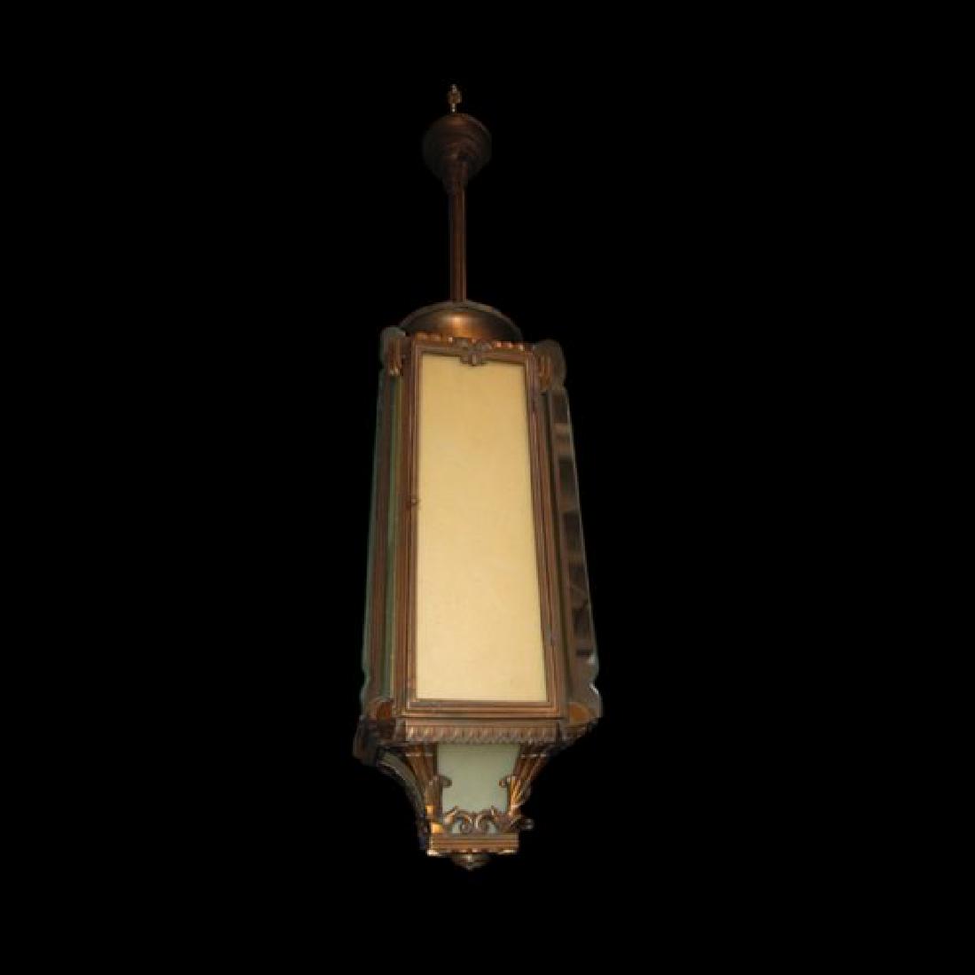 Bronze Art Deco Hanging Light Fixtures with Original: Bronze Art Deco with original glass (three available). These pieces came from a downtown Los Angeles theatre. They are original and really beautiful. We will sell them individually or by sets. We have