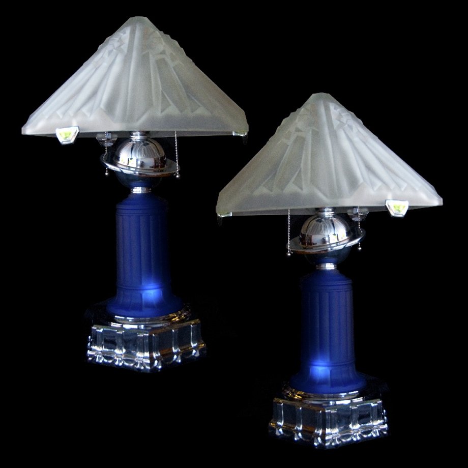 7685 Pair of Cobalt Glass Art Deco Machine Age Lamps: Height: 23 in. (58.42 cm) Width: 14 in. (35.56 cm) Depth: 14 in. (35.56 cm) Country of Origin: USA Style: Art Deco/Machine Age Maker: Rick Derico Condition: Excellent Year: 20th C. Spectacular pair of