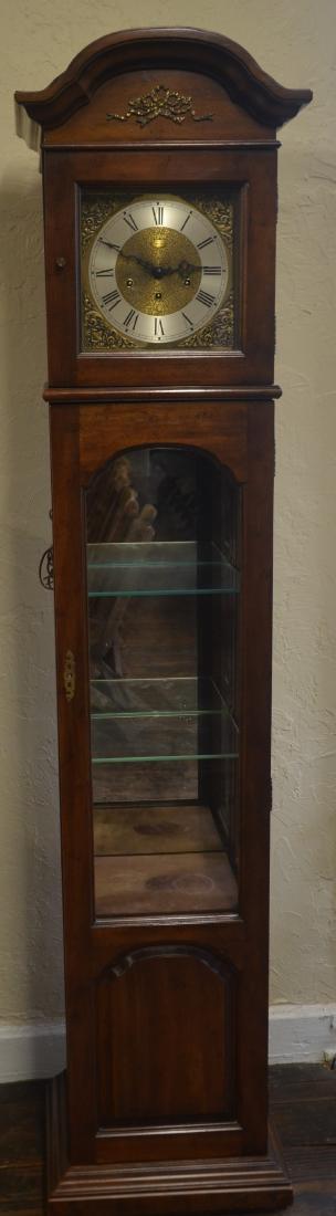 Ethan Allen Clock: Very nice vintage Ethan Allen clock with glass shelving. Comes with the original clock winding key and original paperwork.