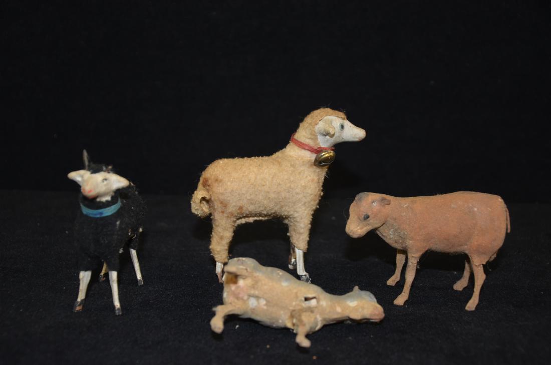 Antique German Pull toys: Up for auction is a lot of assorted German animal toys. They are all missing the bottom platform wheels. The sheep is missing bottom feet and the goat is missing a horn. These toys have several struct