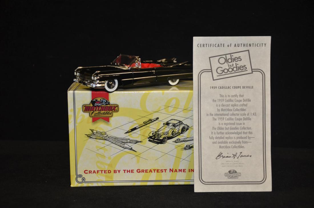 Match Box Die Cast 1959 Cadillac Coupe Deville: Up for auction is a Match Box collectible Die cast 1/43 scale Cadillac Coupe Deville with the original box and paper work.