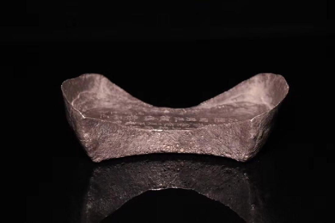 A CHINESE SILVER MONEY BLOCK (1 of 7)