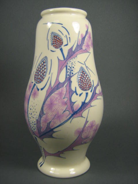 Gouda Amphora White Thistle Vase: Gouda Amphora Factory White Thistle high glaze vase. Circa 1920. Measures 8" tall. Good condition.