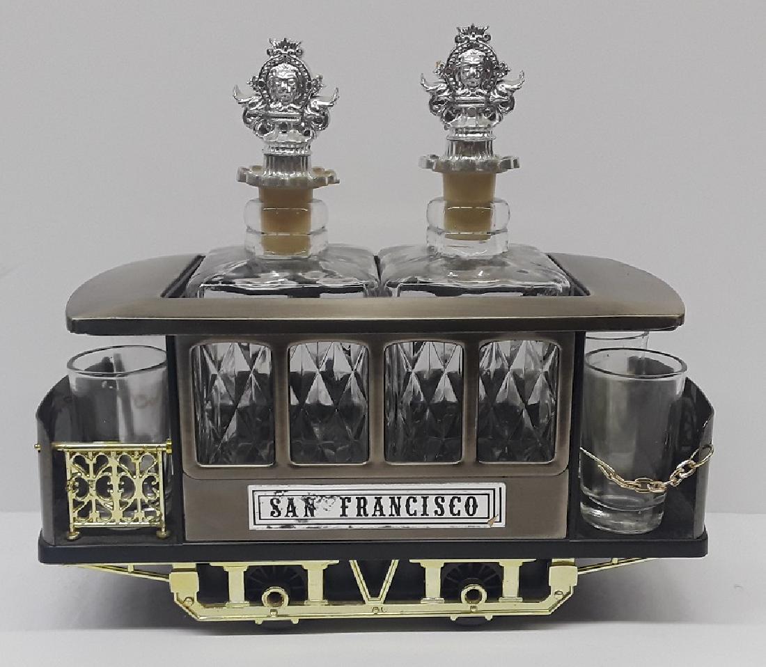 Vintage Musical Trolly Car Bar / Liquor Set: Very Cool Set, When Decanter is removed music plays! Still Works! Great Bar top Piece.