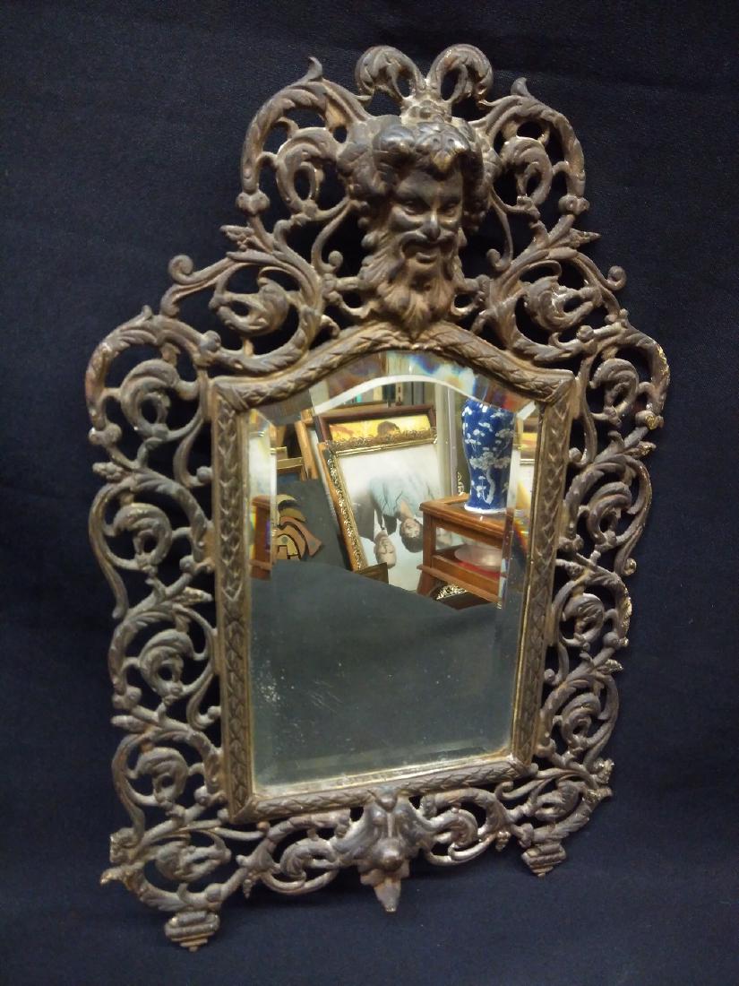 Antique Bronze Bradley & Hubbard Bacchus Mirror: Antique Bronze Bradley & Hubbard Bacchus Wall Mirror. Marked on back. Beveled glass. Measures approx 15 x 10 inches.