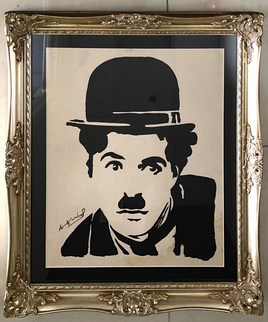 Andy Warhol American Pop Art Charlie Chaplin style: This lot consists of a hand painted Charlie Chaplin portrait mixed media on paper in the style of Andy Warhol. Any Warhol (born Andrew Warhola; August 6, 1928 - February 22, 1987) was an American arti