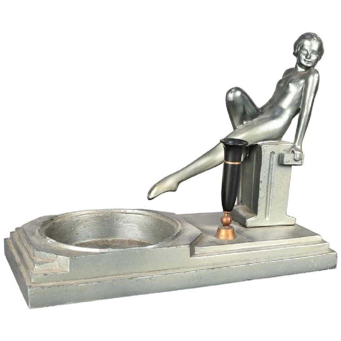 Antique Art Deco Frankart School Seated Nude Desk Tray: Antique Art Deco Frankart School desk tray features seated nude woman with outstretched leg over circular tray in stepped base with pen holder, circa 1930 Measures: 7.75" H 10" W x 5" D overall; 4" di