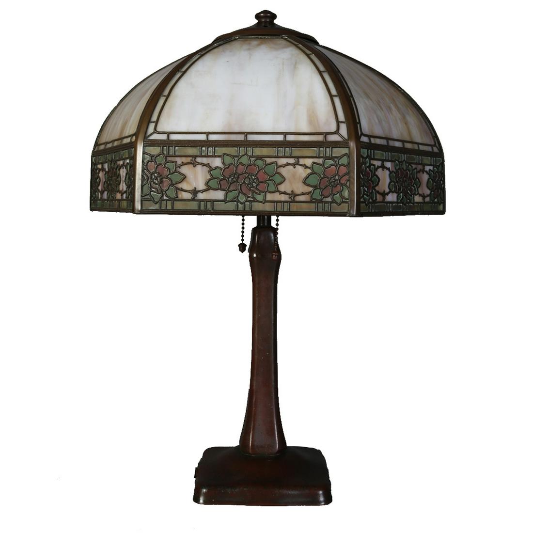 Arts & Crafts Handel Overlay Slag Glass Table Lamp: An antique Arts & Crafts Handel Table Lamp offers dome form shade with floral overlay frame housing bent slag glass and surmounting double socket base, c1920. Measures - 20.5" h x 15.25" diam, 5.75" x