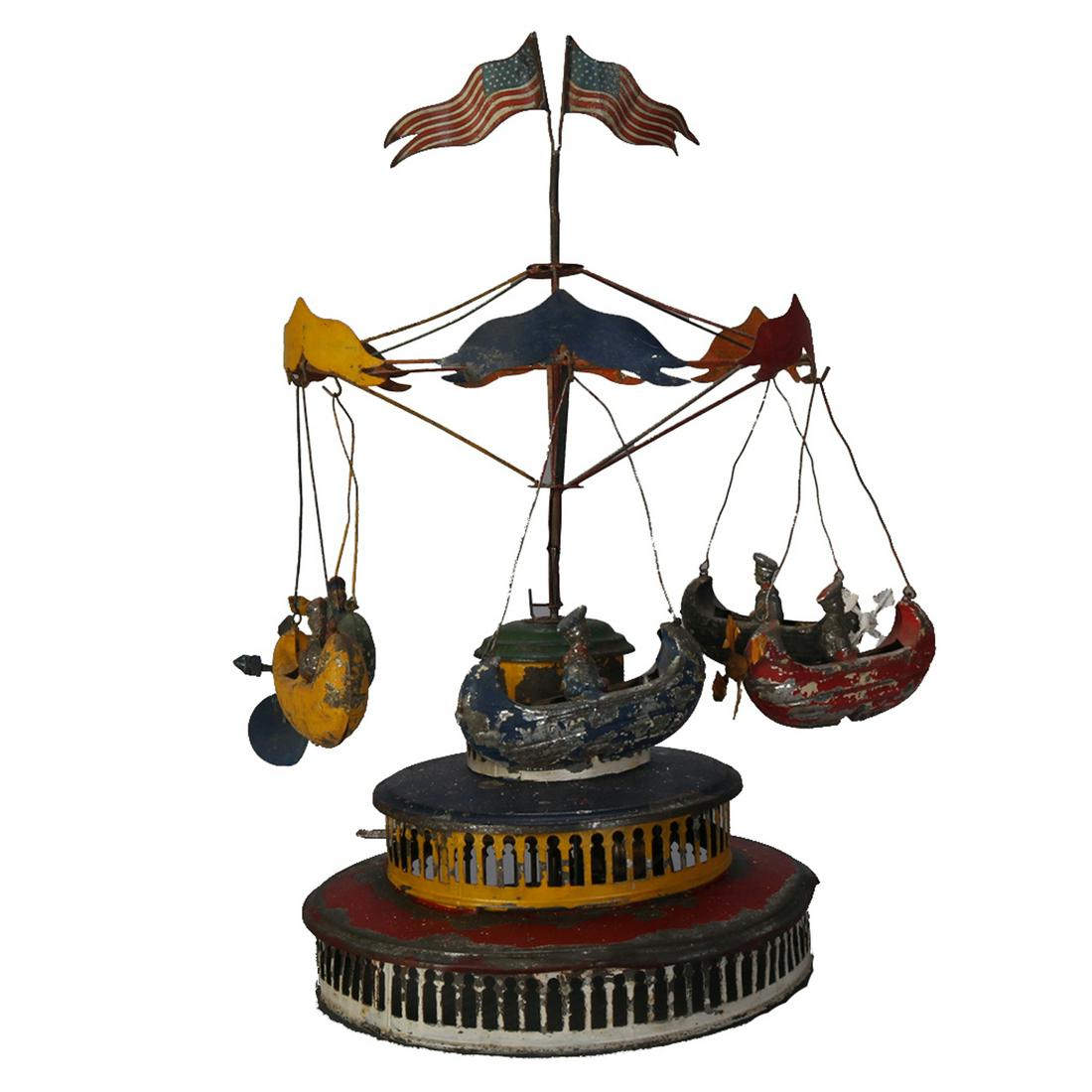 Gunthermann School Clockwork Polychrome Tin Carousel: An antique Gunthermann School clockwork mechanical merry-go-round carousel polychromed tin plate toy, c1890. Measures - 18" h x 11" w x 8.5" bs ***IN-HOUSE SHIPPING & DELIVERY QUICK QUOTES AVAILABLE U