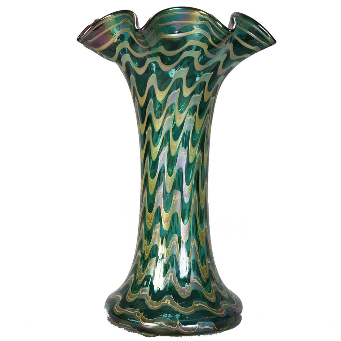 Oversized Loetz Phanomen Style Art Glass Vase, c1920: An antique and large vase in the manner of Loetz offers Phanomen style design with translucent emerald green art glass vessel having ruffled rim with free form decoration and signed on base Loetz Aust