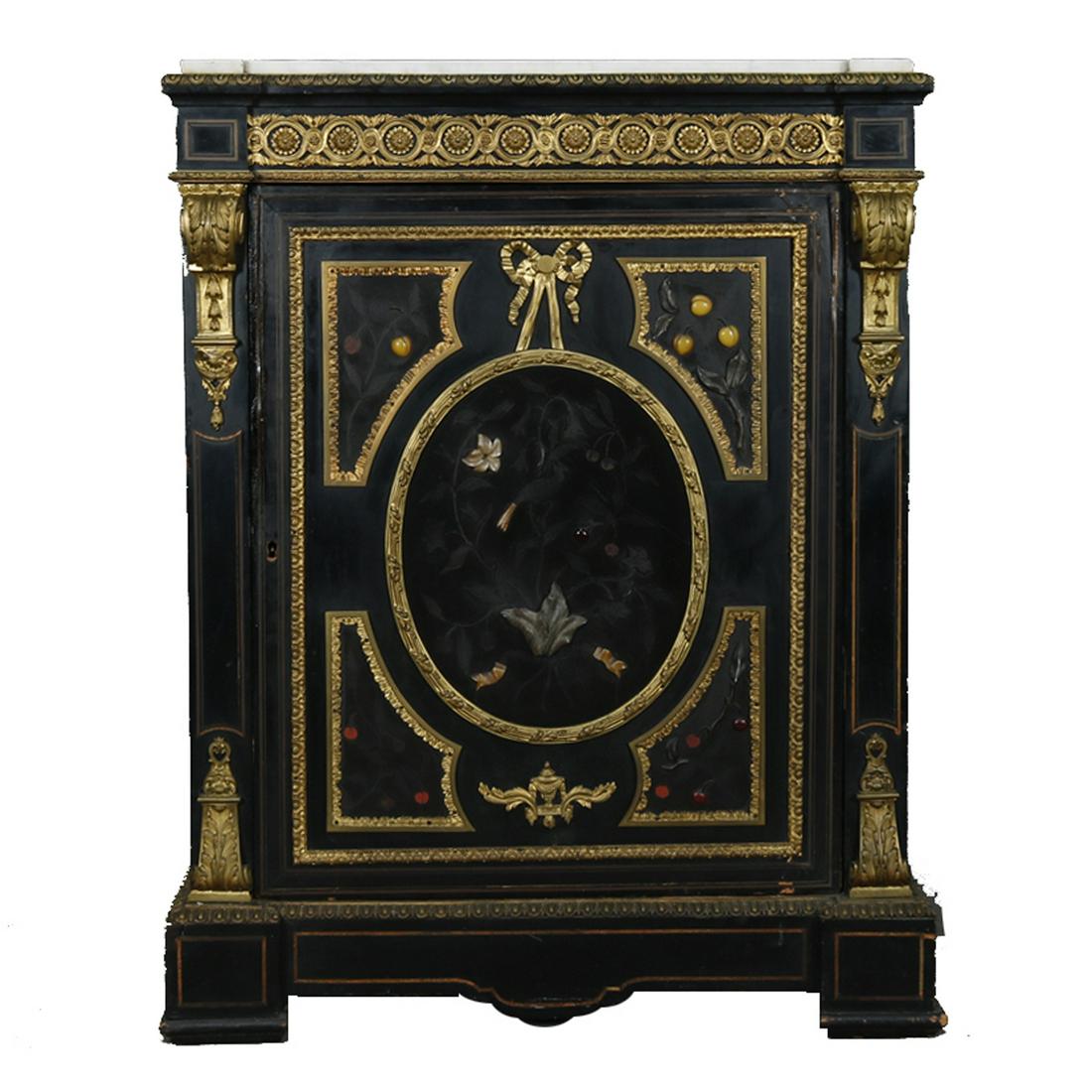 French Louis XVI Ebonized Credenza w/Gilt Bronze: An antique French Louis XVI ebonized single door credenza offers gilt bronze mounts, marble top, carved hard stone & Boulle inlay, c1870. Measures - 45.5" h x 35" w x 17" d ***IN-HOUSE SHIPPING & DELI