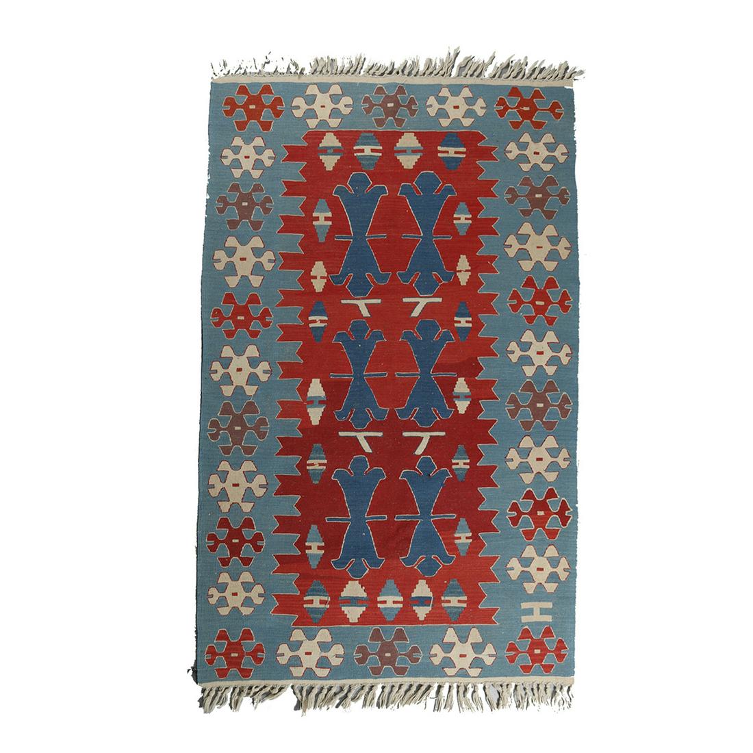 Vintage Islam Kilim Tribal Area Rug, c1940: A vintage Islam Tribal Kilim area rug offers flat weave construction with geometric patterned field with stylized figures and shields, border with repeating stylized star pattern, elements of Navajo, 
