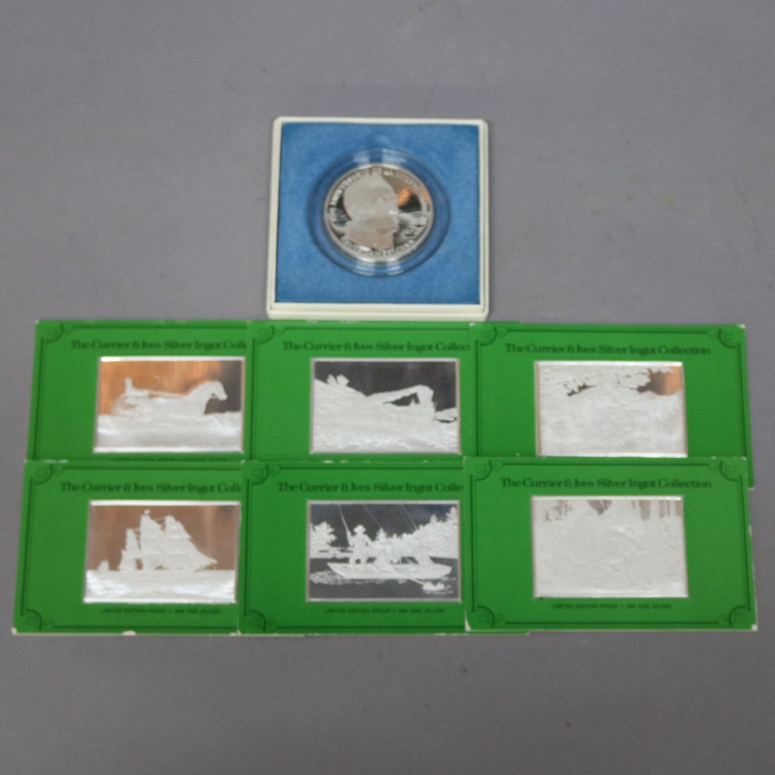 Franklin Mint Silver Currier & Ives Ingots, Panama Coin: 1971 Coin, Panama 20 Balboas & 1974 Franklin Mint Currier & Ives Silver Ingot Collection. Sealed in original package - American Express Train, Haying Time, Clipper Ship, The Life of a Hunter, Catching