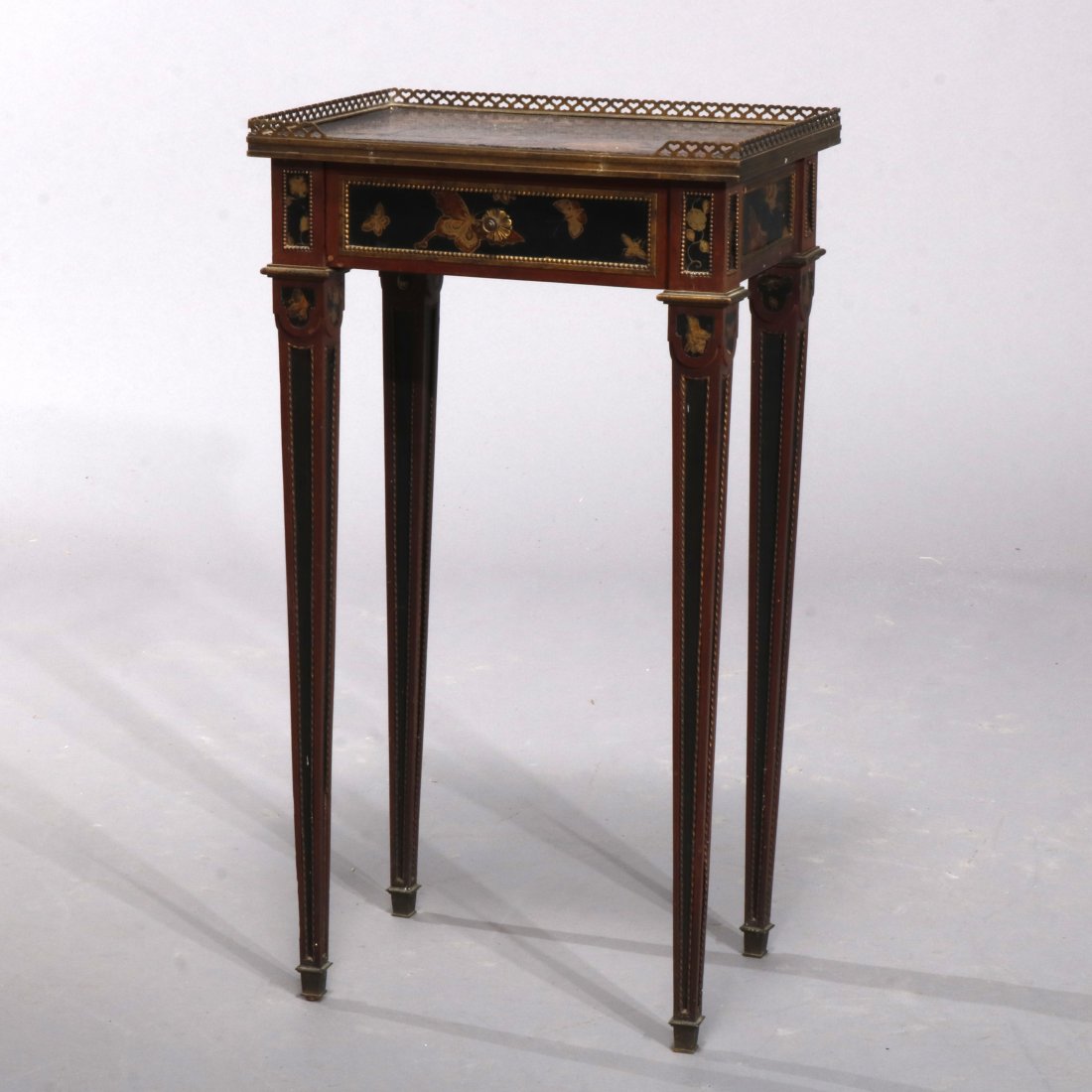 Antique French Louis XVI Chinoiserie Linke School Stand: An antique French Louis XVI side stand in the manner of Francois Linke offers pierced bronze gallery surmounting Chinoiserie decorated ebonized and gilt case having single drawer, raised on squared an