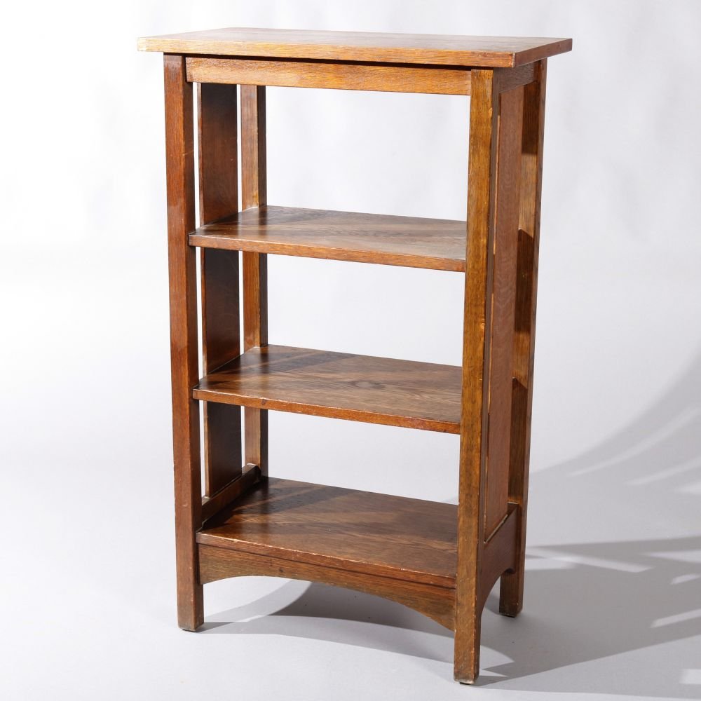 Antique Rare Arts & Crafts L & JG Stickley Oak Stand: A rare antique Arts & Crafts magazine stand Catalog #40 by L & JG Stickley offers quarter sawn oak construction with slat sides and three shelves, C1910. Measures- 39.13" H x 23.13" W x 13" D. ***IN-H