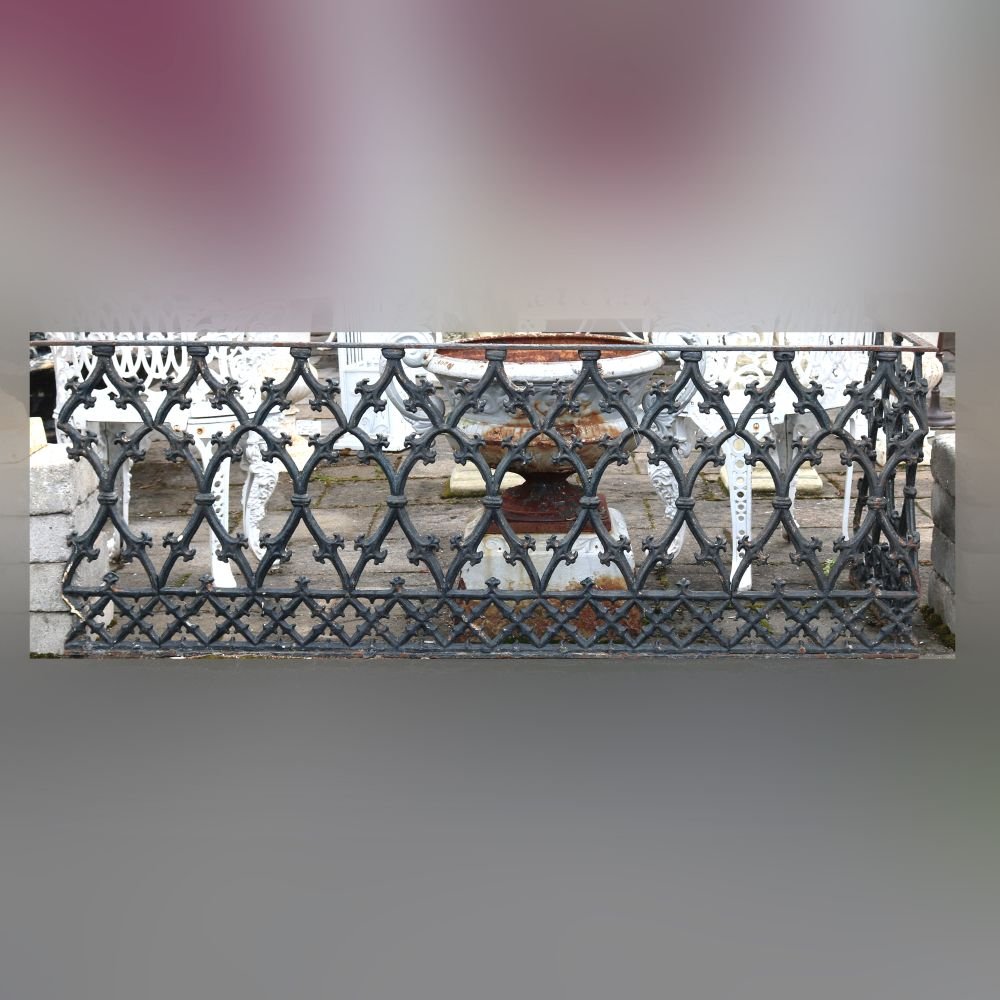 2 Antique Cast Iron Balcony-Fence Corners: A pair of antique balcony or fence corners offer cast iron construction with scroll lattice design, painted black, architectural elements, 19h century. Measures- 71.5" W x 25.68" H, Elbow- 25.68" H x 
