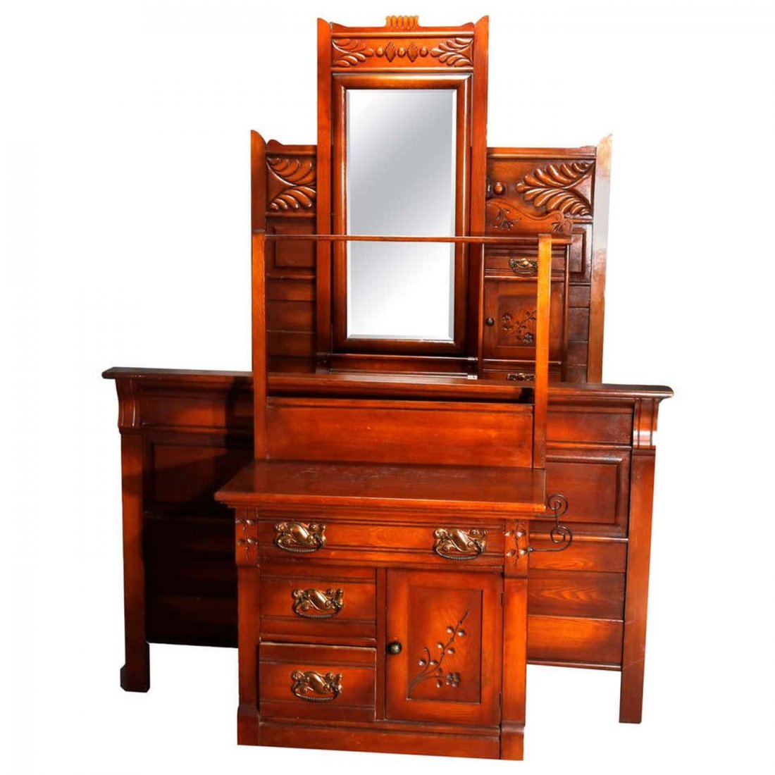 Victorian 3 Piece Eastlake Chip Carved Oak Bedroom Set: An antique Victorian Eastlake bedroom suite offers oak construction with carved stylized foliate elements and includes full size tall back bed, dressing bureau with long mirror and bonnet box, and was