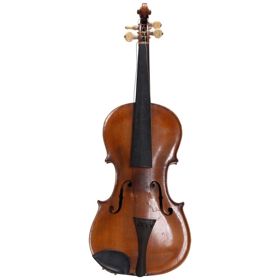 Antique German Violin by Klotz, circa 1900: An antique German Violin by Klotz, circa 1900. Measures: 23.13" H x 7.75" W x 3.38" D. Additional Information: Klotz is a family of violin makers. Members of the Klotz (or Kloz) family have made violi